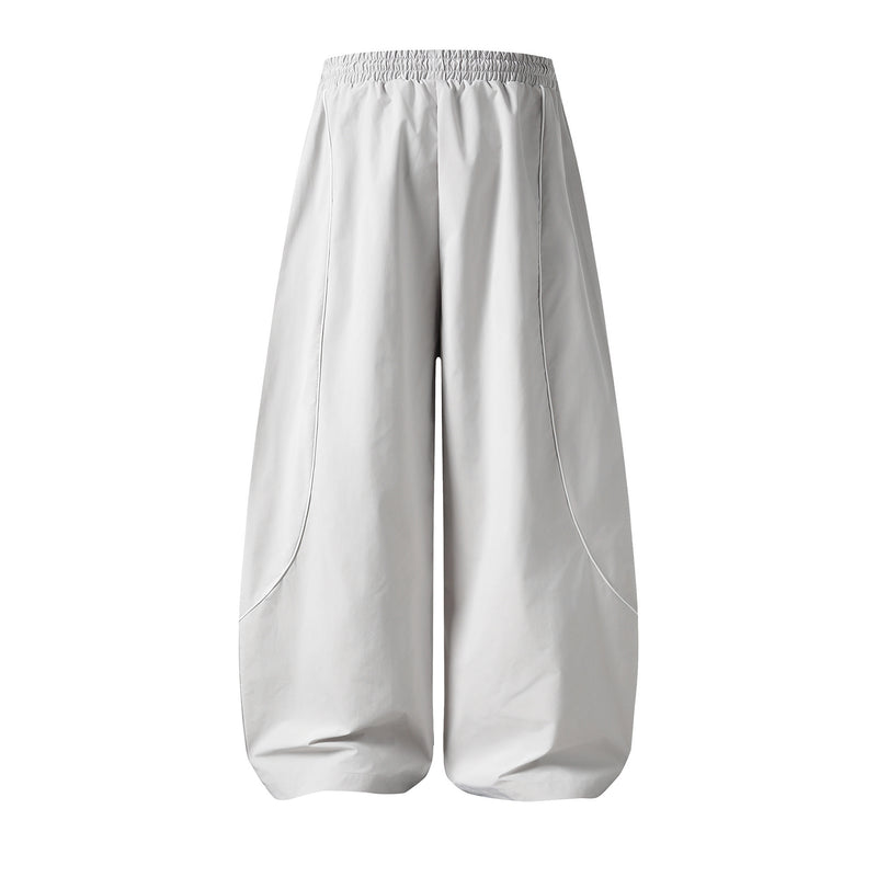 Herren-Trackpants mit kontrastierender Paspel und Colorblock-Seiteneinsätzen