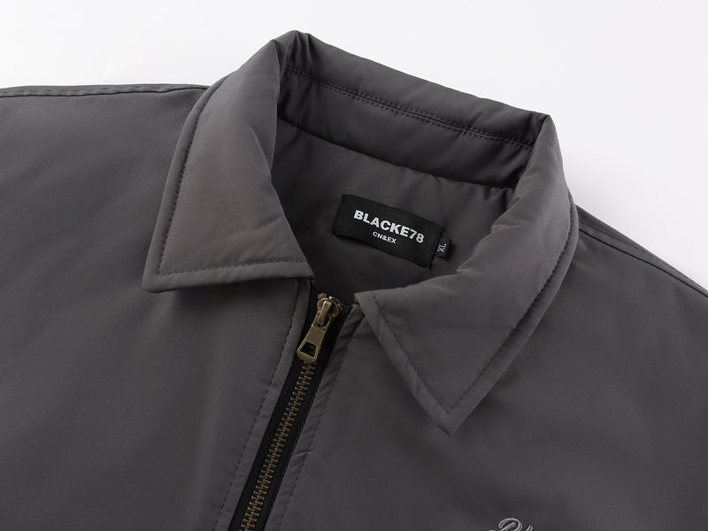 Veste bomber matelassée pour homme avec col à pointes et coutures arrondies