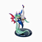 The Hatsune Miku Light & Dark 17cm PVC Figure showcases her in a blue dress, long green hair, and striking red and blue bat wings. She sits gracefully with one leg raised on a black stand, blending angelic and demonic elements.