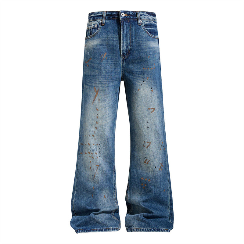 Men's washed distressed blue flare jeans with rust graffiti and paint-splatter print, front and back view