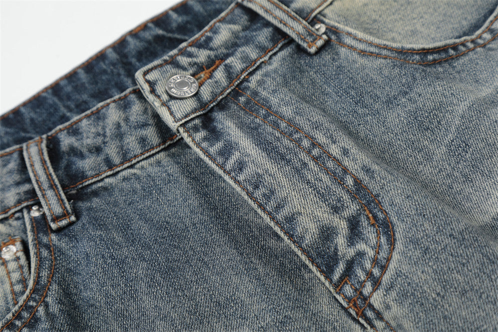 Vintage Washed Wide-Leg Flare Jeans – Distressed Faded Denim with Crease Detail