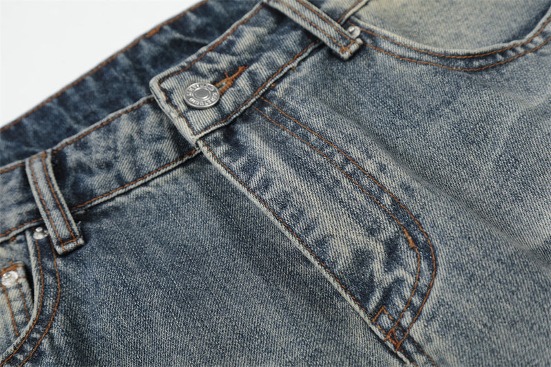Vintage Washed Wide-Leg Flare Jeans – Distressed Faded Denim with Crease Detail
