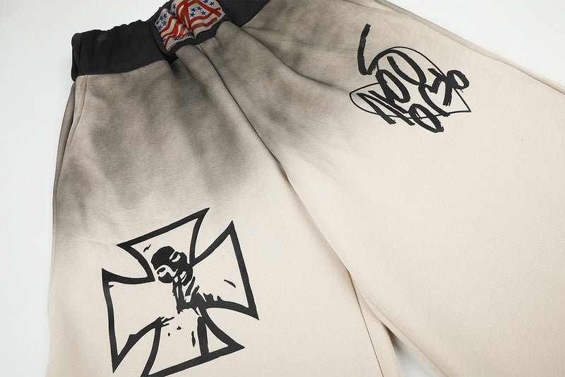 Wide-Leg Sweatpants with Iron Cross Graffiti Print – Washed Streetwear Baggy