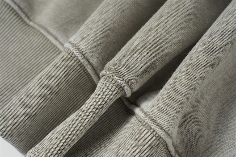 Sweat à capuche zippé homme délavé à l’acide, avec zip diagonal et empiècements déconstruits