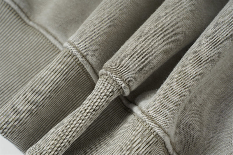 Sweat à capuche zippé homme délavé à l’acide, avec zip diagonal et empiècements déconstruits