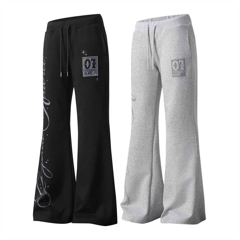 Pantalon de jogging flare wide leg homme avec imprimé script et taille élastique