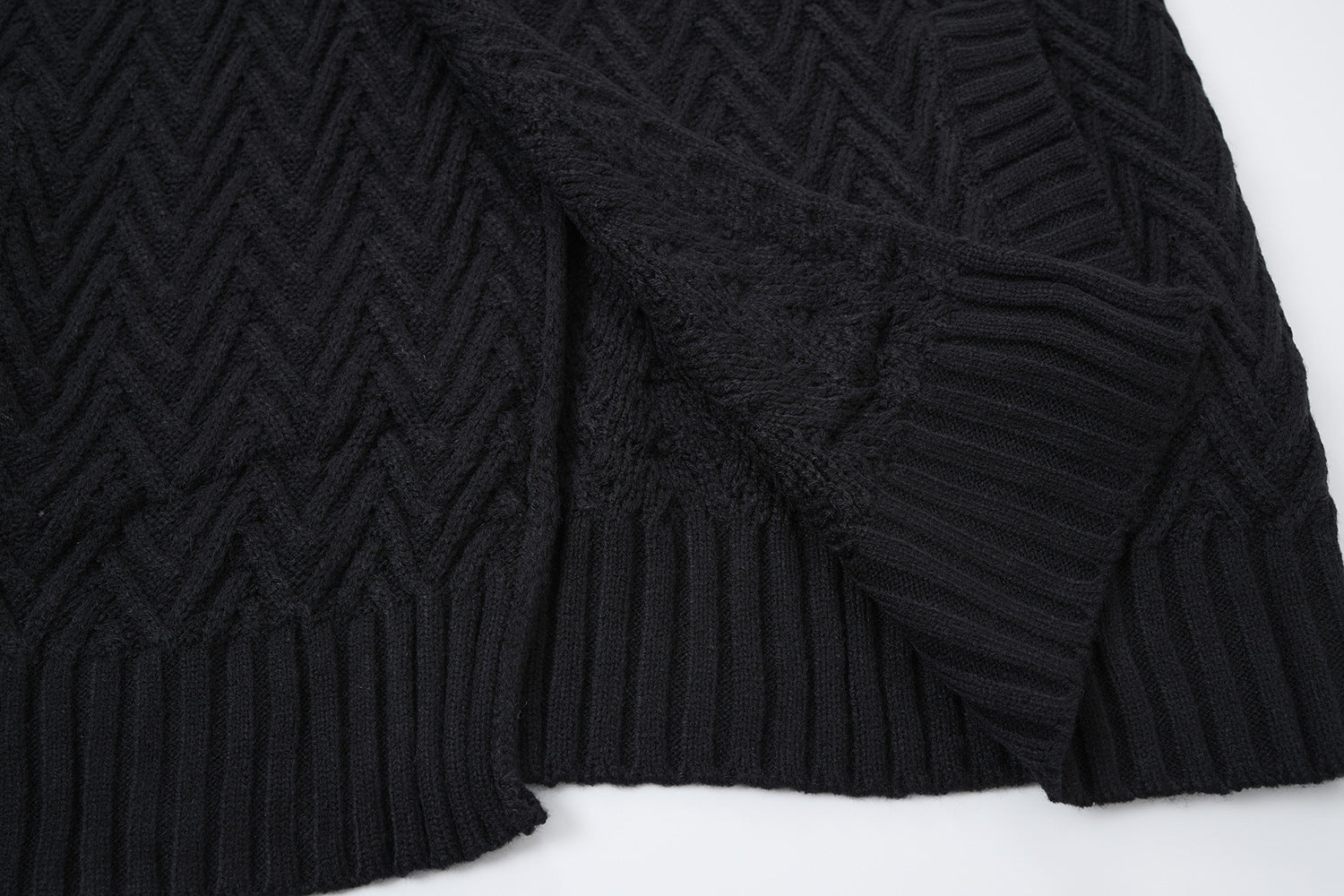 Cardigan en maille torsadée chevrons avec col châle et poches avant