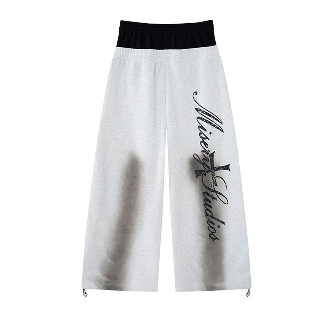 Pantalon de survêtement ample à jambes larges avec bandes latérales, fausse double ceinture et imprimé graphique