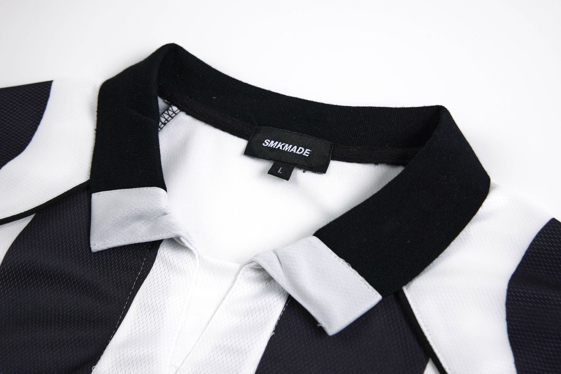 Maillot de football à manches longues noir et blanc à rayures, polo graphique