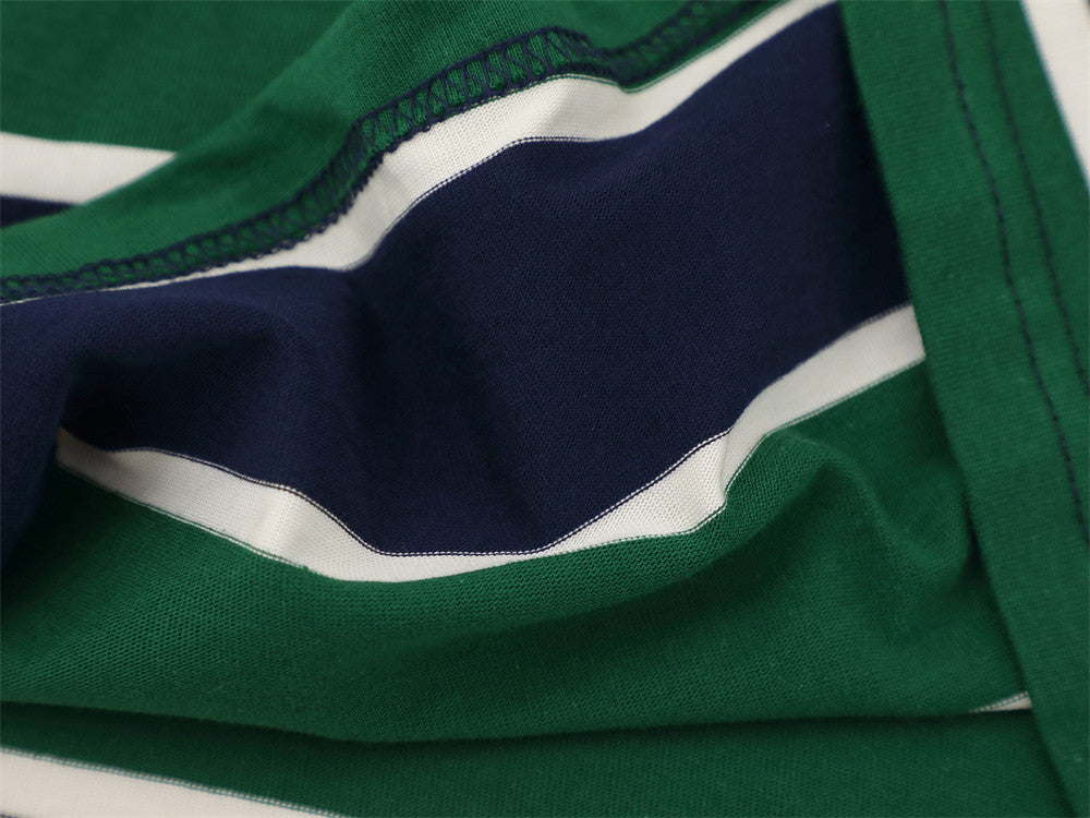 Close-up of inside seam and striped fabric on long sleeve polo shirt