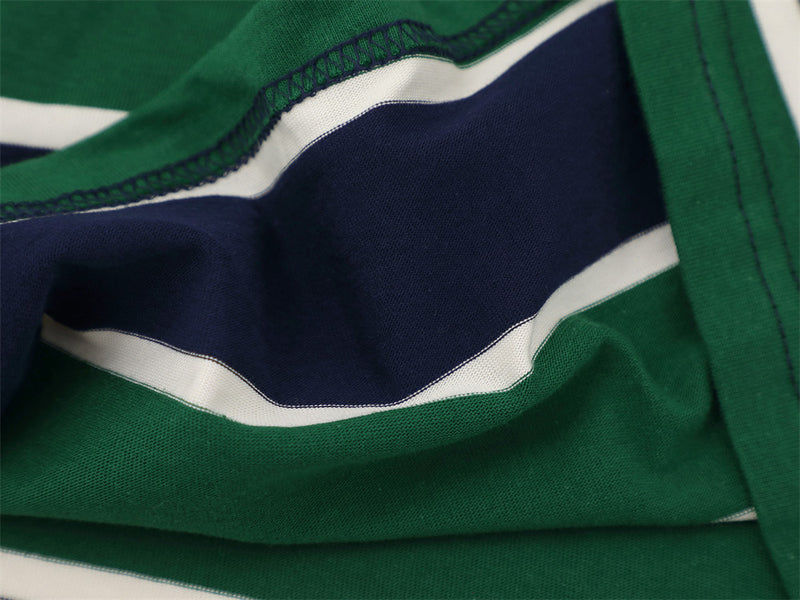 Close-up of inside seam and striped fabric on long sleeve polo shirt