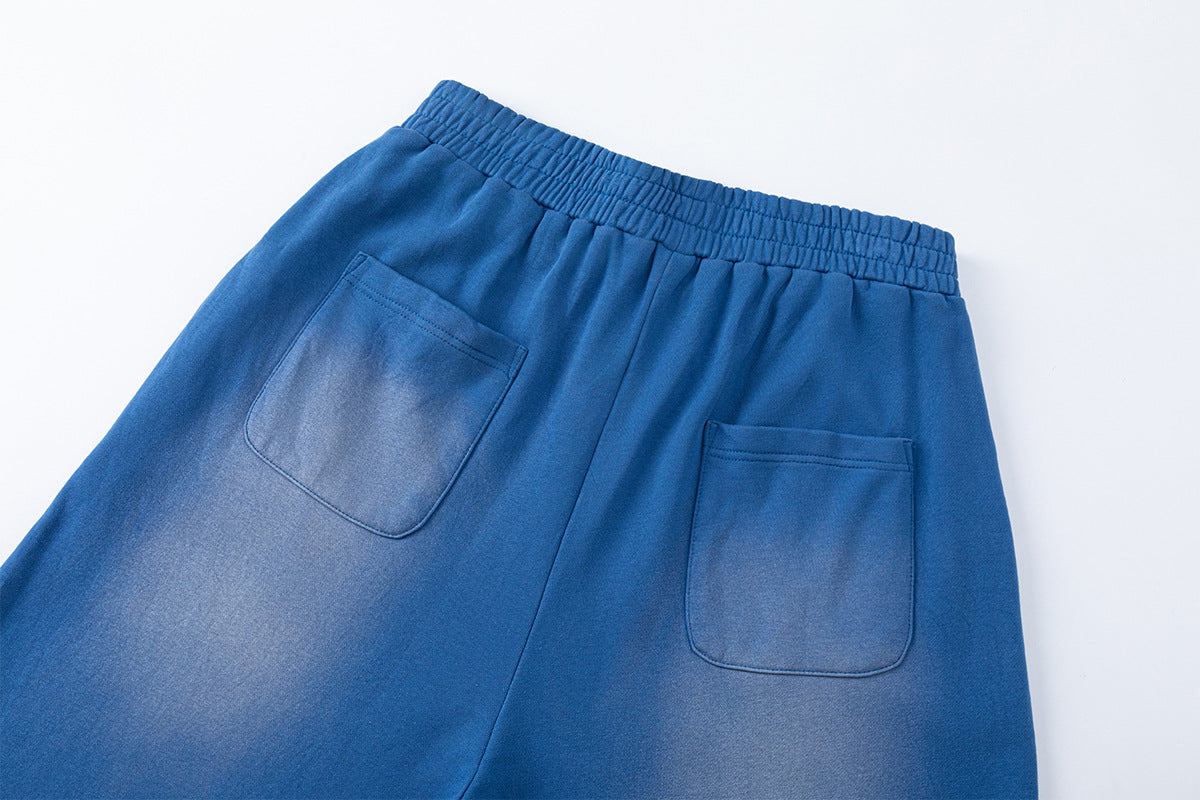 Pantalon de survêtement à jambes larges avec motif d’étoiles et de lettres, coupe décontractée délavée