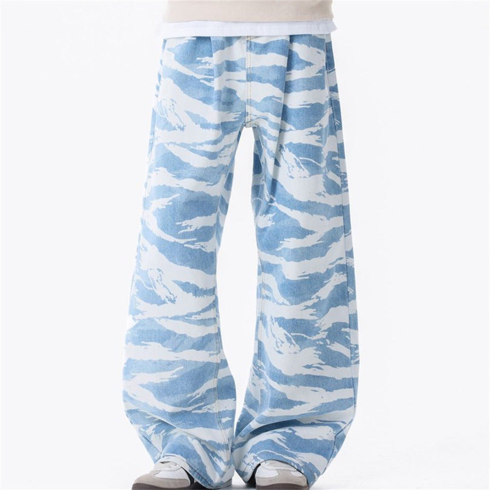 Front view of baggy light blue wide-leg jeans with white zebra camo print