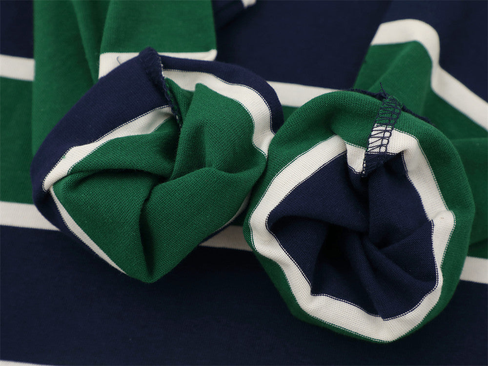 Close-up of cuff openings on striped long sleeve rugby polo shirt
