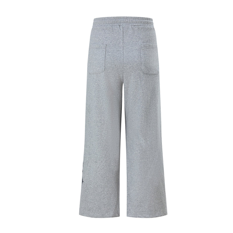 Pantalon de survêtement wide leg avec écusson varsity et motif graphique numéro 28