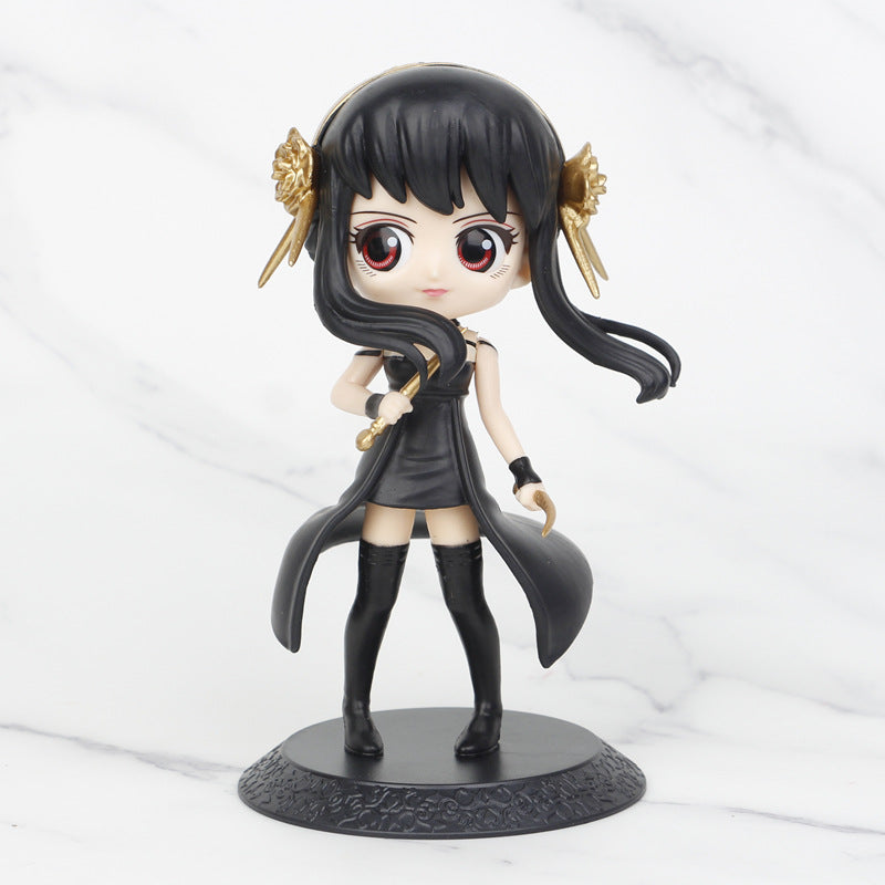 The Spy × Family Complete Set includes 15cm PVC figures of Anya, Loid, and Yor. Yor is elegantly posed in a sleek black outfit with thigh-high boots and gold accessories, making her a stunning addition to any collection.