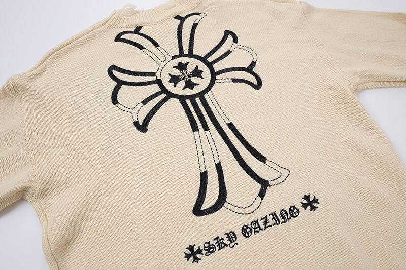 Pull en maille destroy à broderies croisées – Sweat oversize à col rond