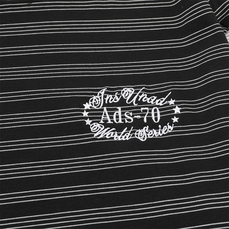 T-shirt homme manches longues noir et blanc à rayures color block, col rond oversize
