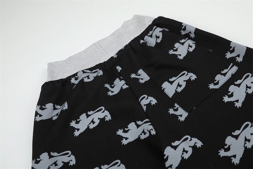 Pantalon de survêtement large imprimé lions, avec bande contrastante taille haute