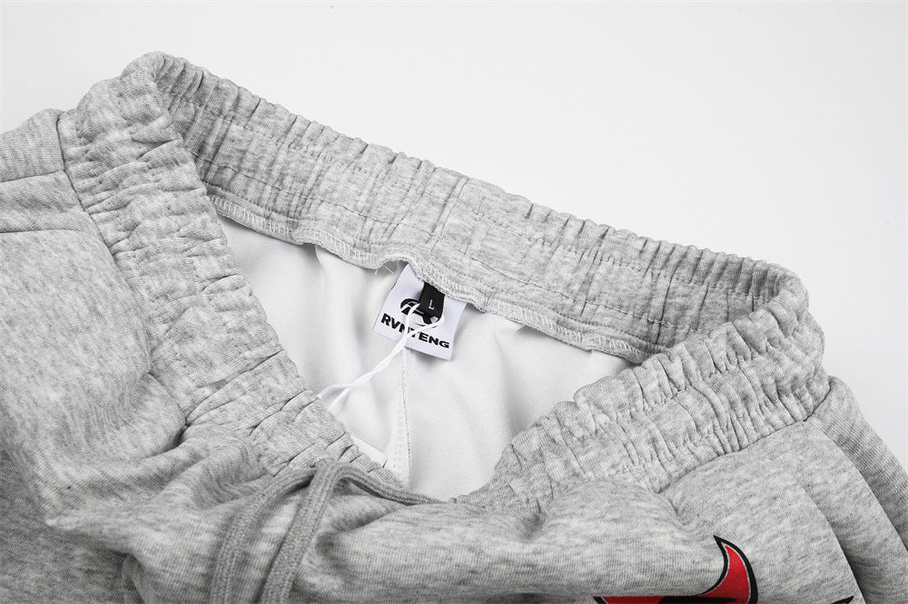 Wide-Leg-Sweathose mit Stern-Grafik und dreifachen Streifen-Details
