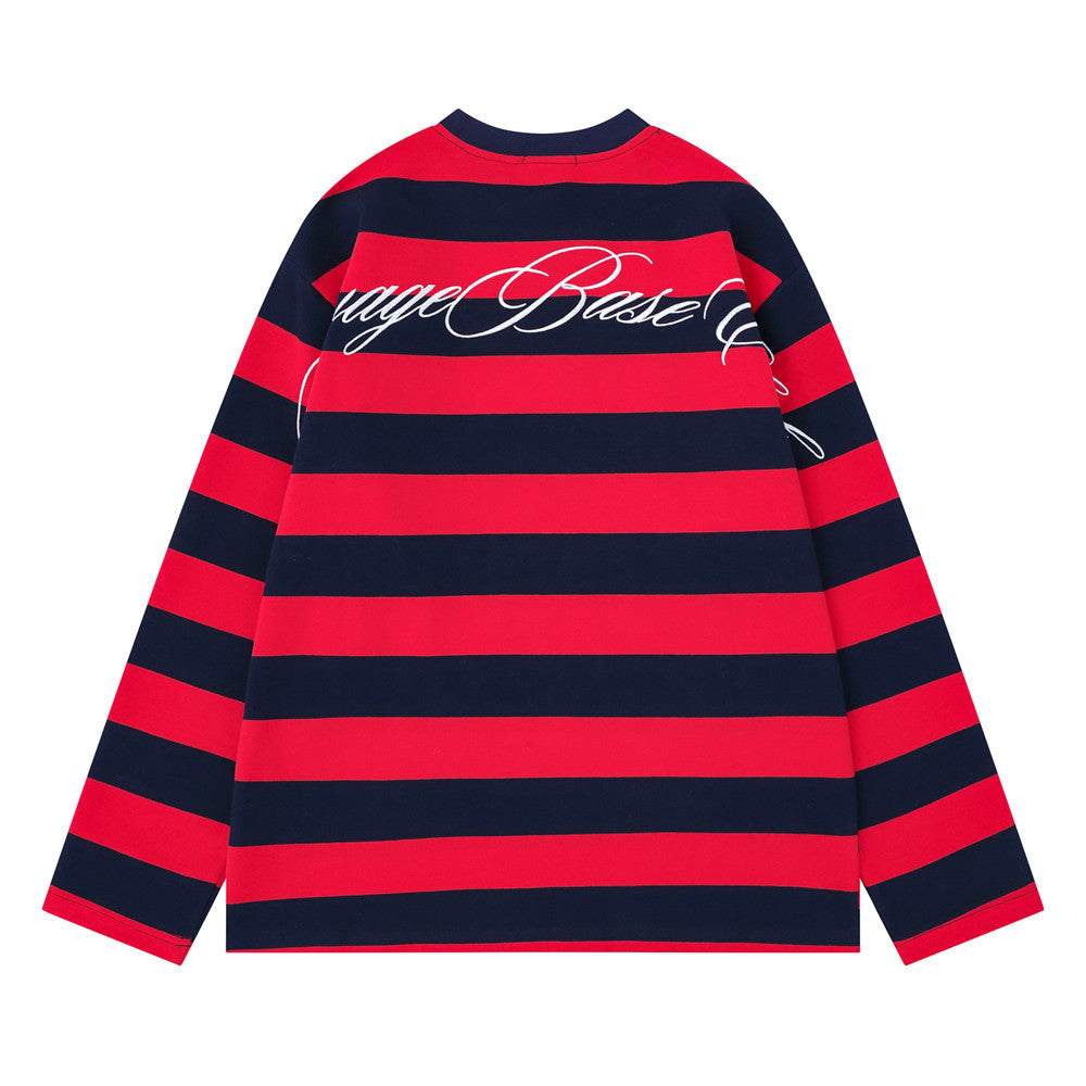Back view of red and navy striped long sleeve crew neck shirt with cursive back graphic