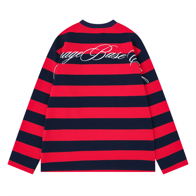 Back view of red and navy striped long sleeve crew neck shirt with cursive back graphic