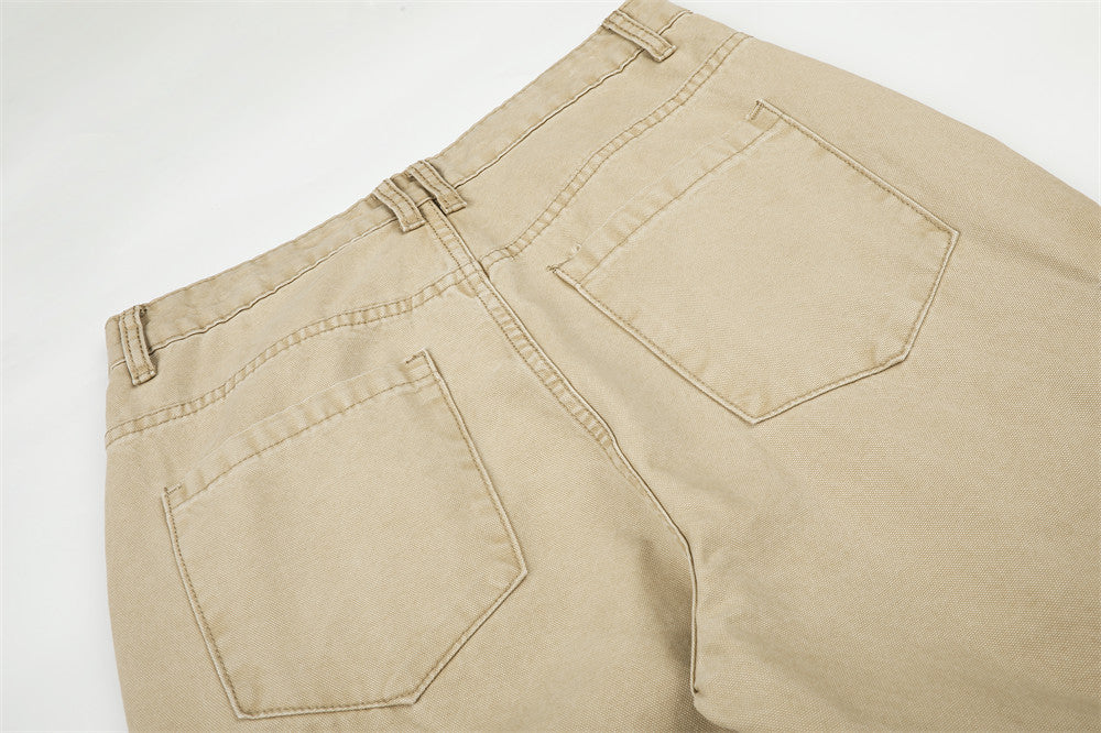 Close-up of beige cargo pants back with two patch pockets