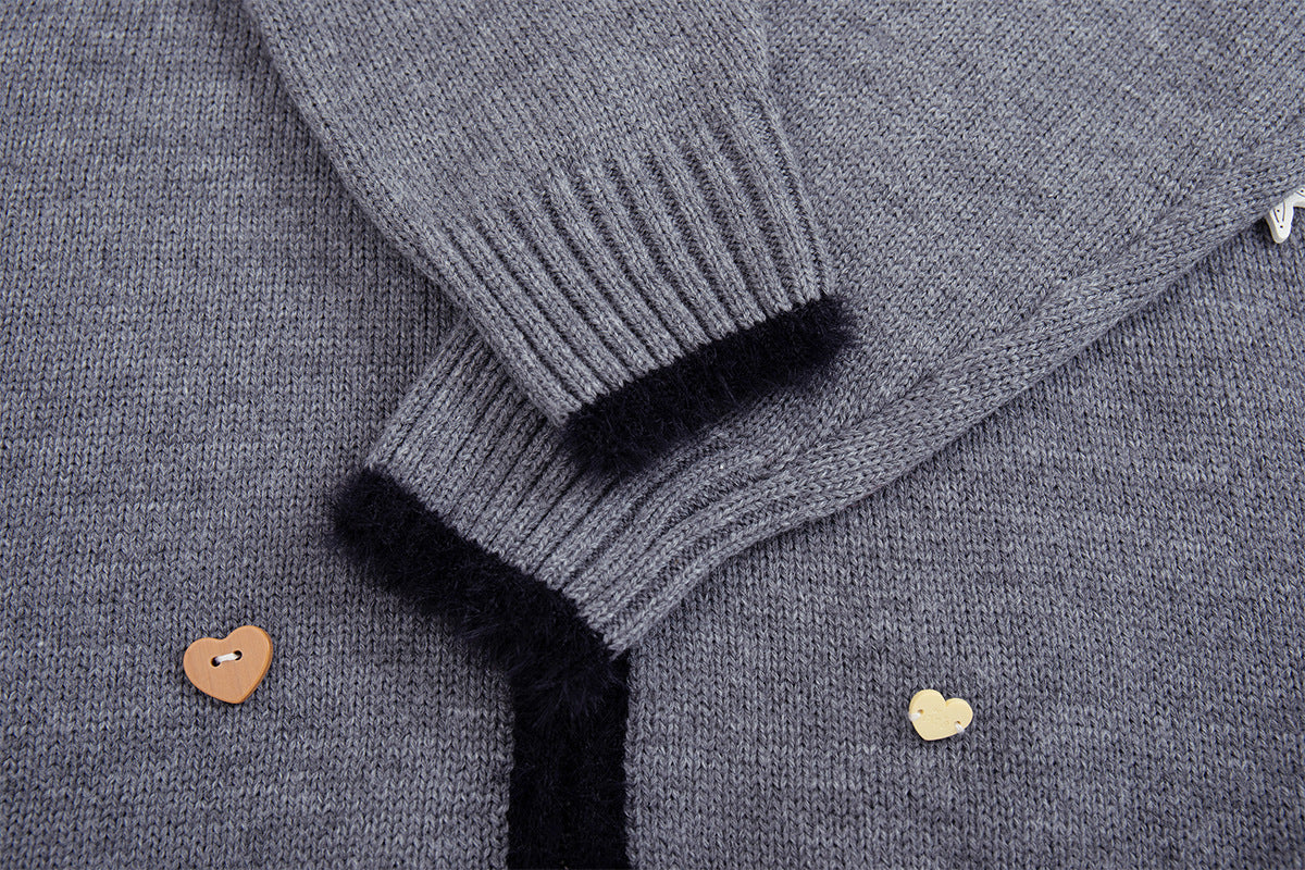 Gilet en maille zippé avec ornements cœur et étoile