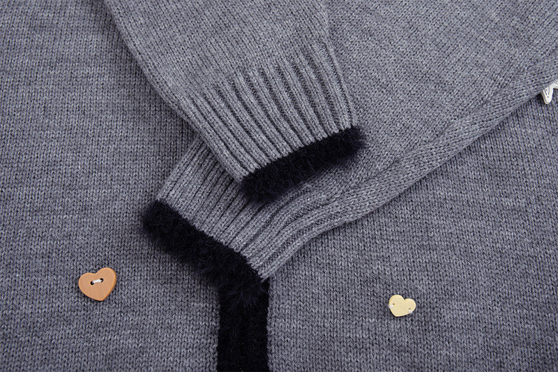 Gilet en maille zippé avec ornements cœur et étoile