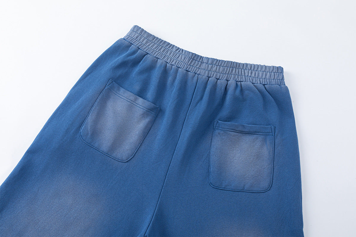Pantalon de survêtement à jambes larges, imprimé graphique vintage effet acid-wash, coupe décontractée