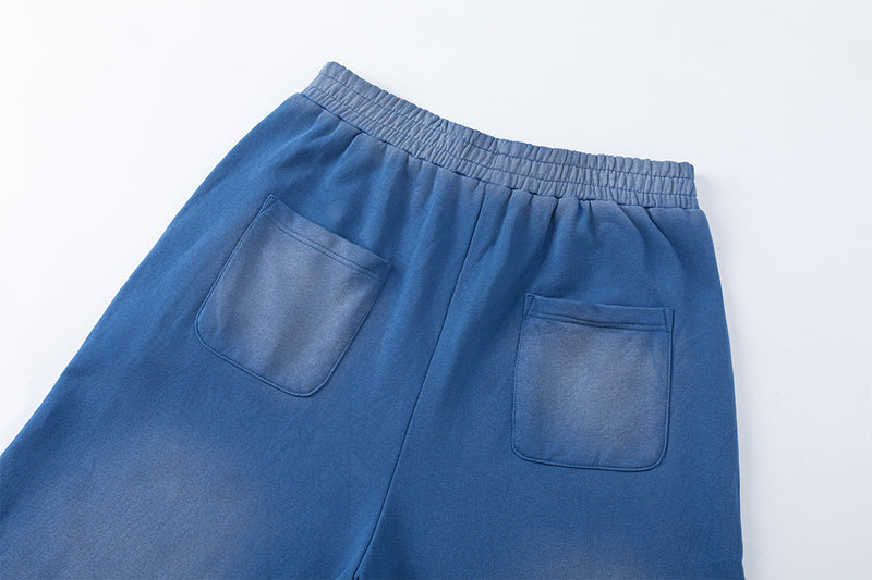 Pantalon de survêtement à jambes larges, imprimé graphique vintage effet acid-wash, coupe décontractée