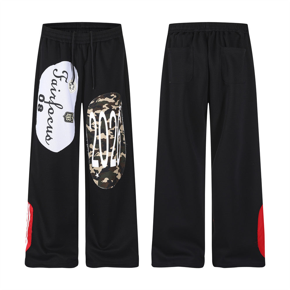 Wide-Leg Sweatpants with Camo & Script Patchwork Appliqués