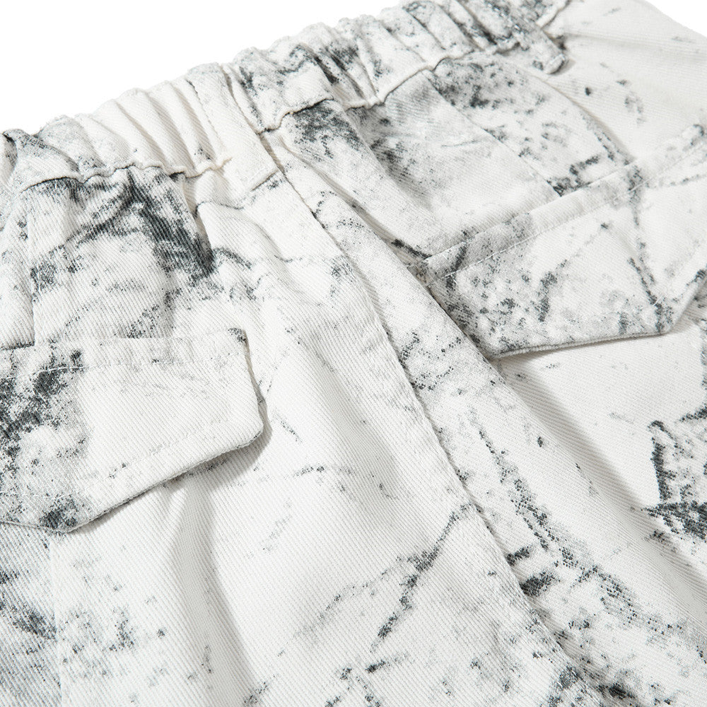 Hose mit weitem, geschwungenem Bein – Ink-Wash-Print, Falten und lockere Baggy-Passform
