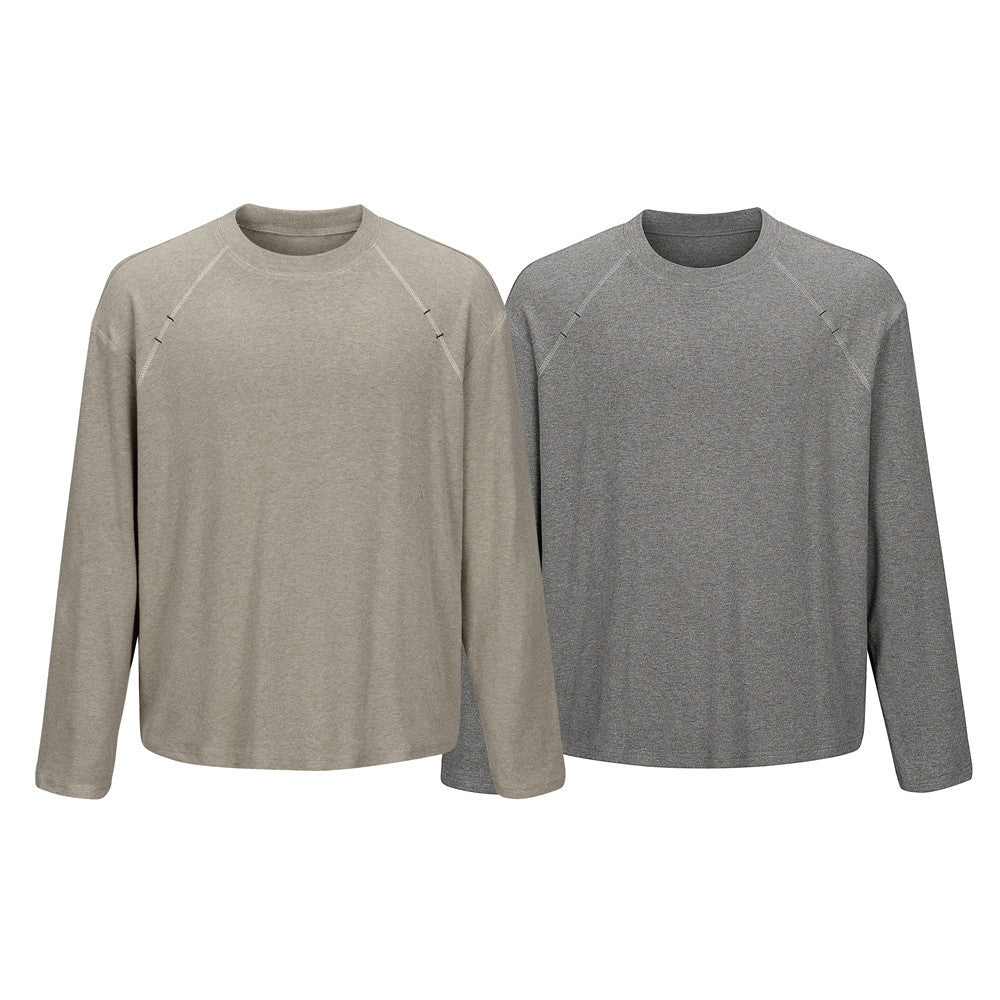 Men's oversized long-sleeve raglan crew neck t-shirt in oatmeal and charcoal grey heather, front view