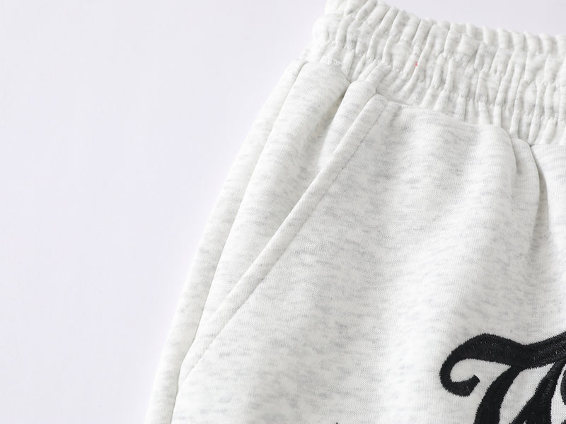 Pantalon de survêtement à jambes larges avec imprimé gothique « Welcome » et deux pistolets – Style streetwear hip-hop