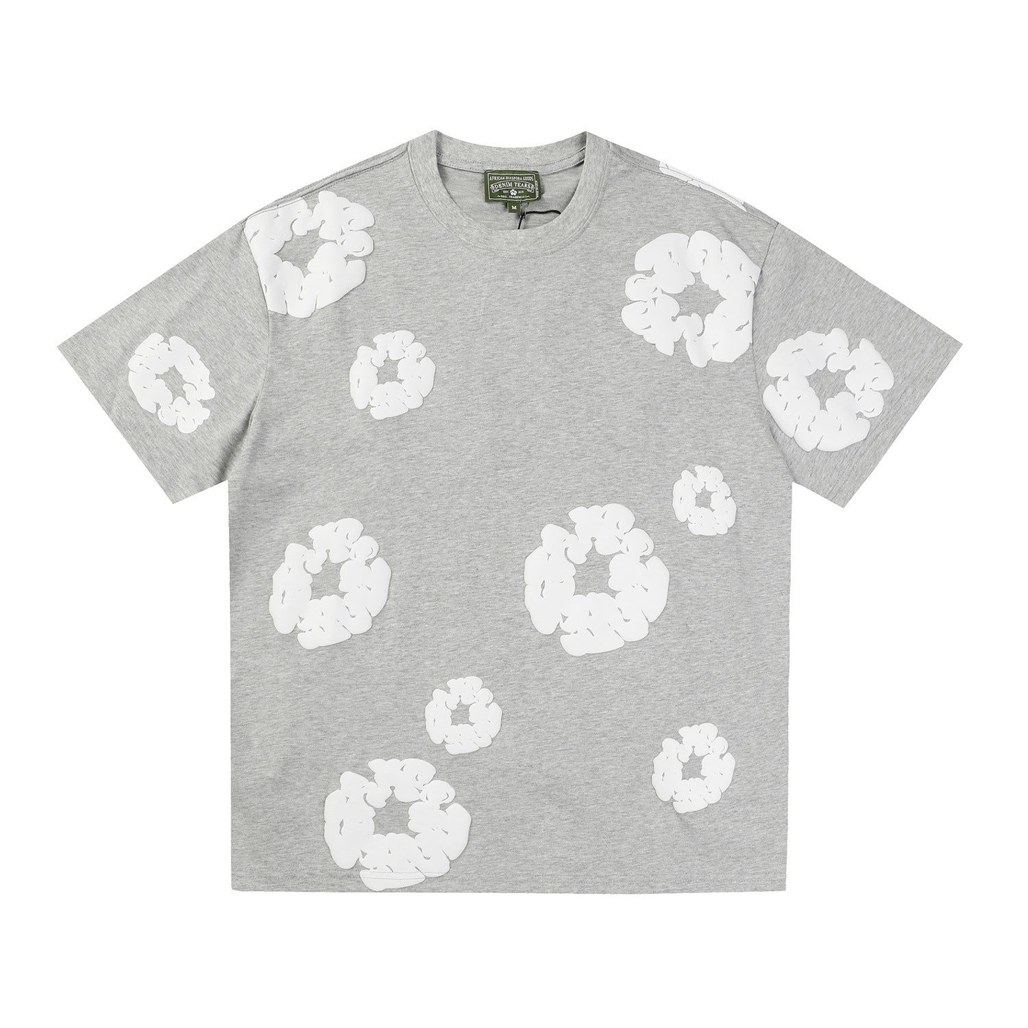 Denim Tears grey heather T-shirt with allover white wreath print on front body and sleeves, laid flat on white background