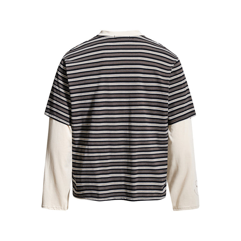 Black striped Henley t-shirt with cream long sleeves, back view
