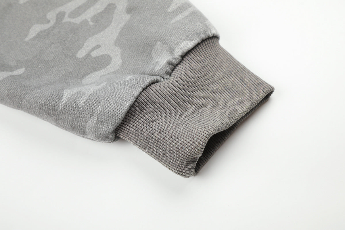 Acid Wash Zip-Up Hoodie with Camo Sleeves and Embroidered Graphic