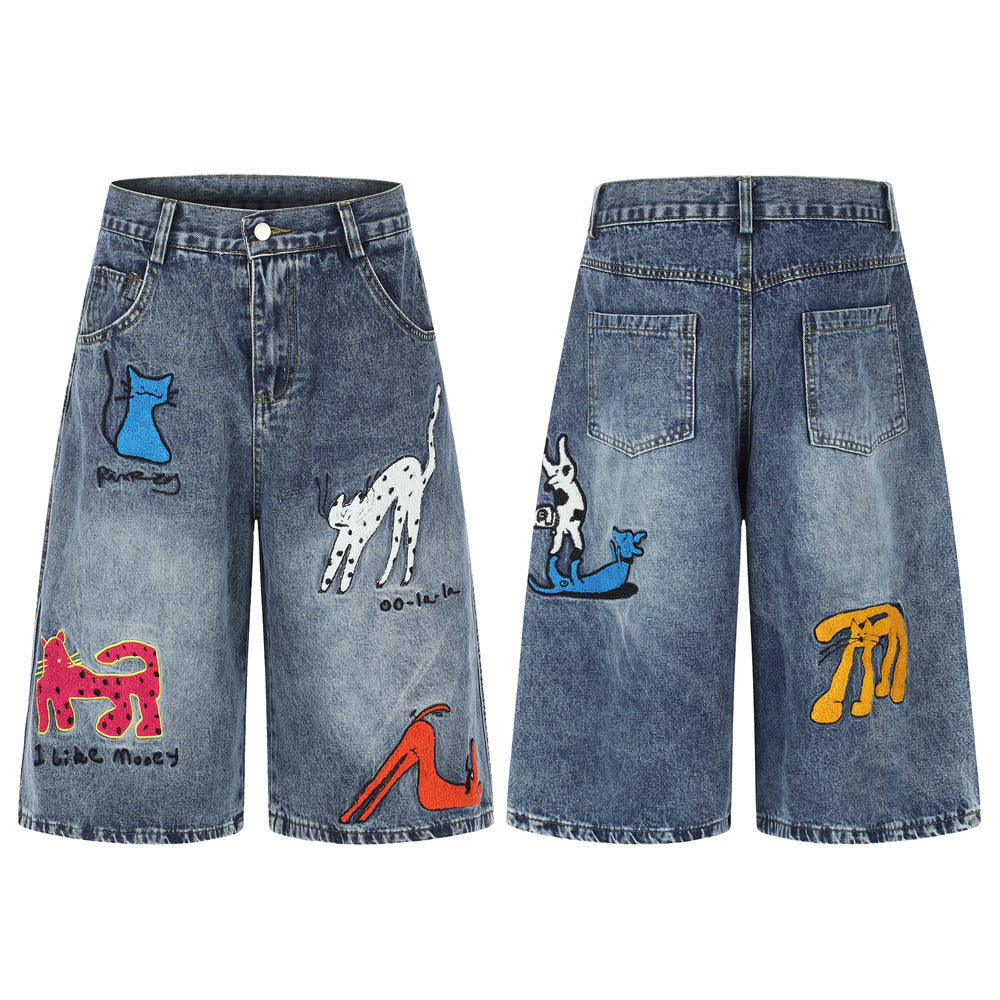 Men's wide-leg vintage washed denim shorts with colorful cartoon cat and dog embroidery on front and back