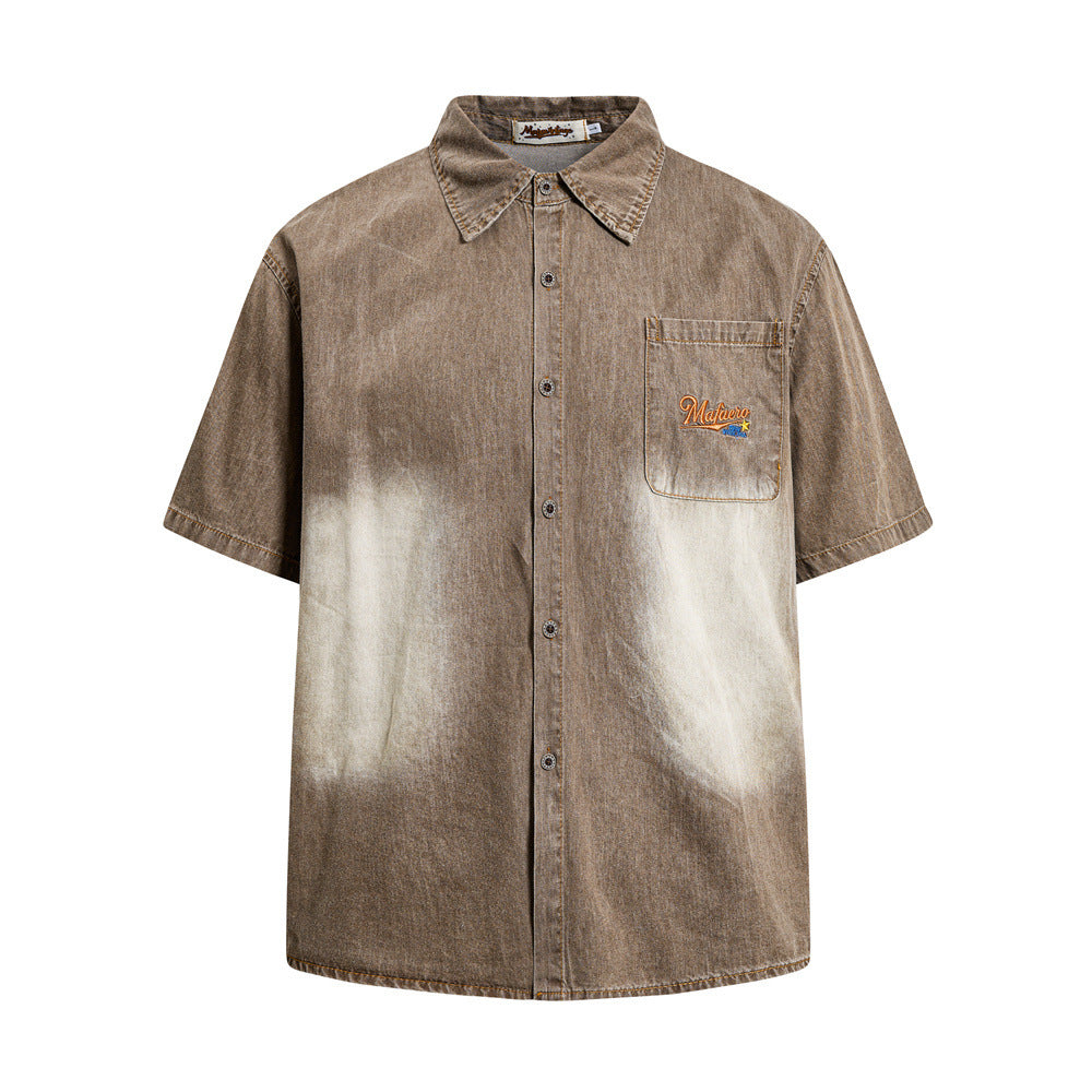 Men's oversized vintage sun-faded washed brown denim short sleeve shirt with embroidered chest logo and contrast bleach detai