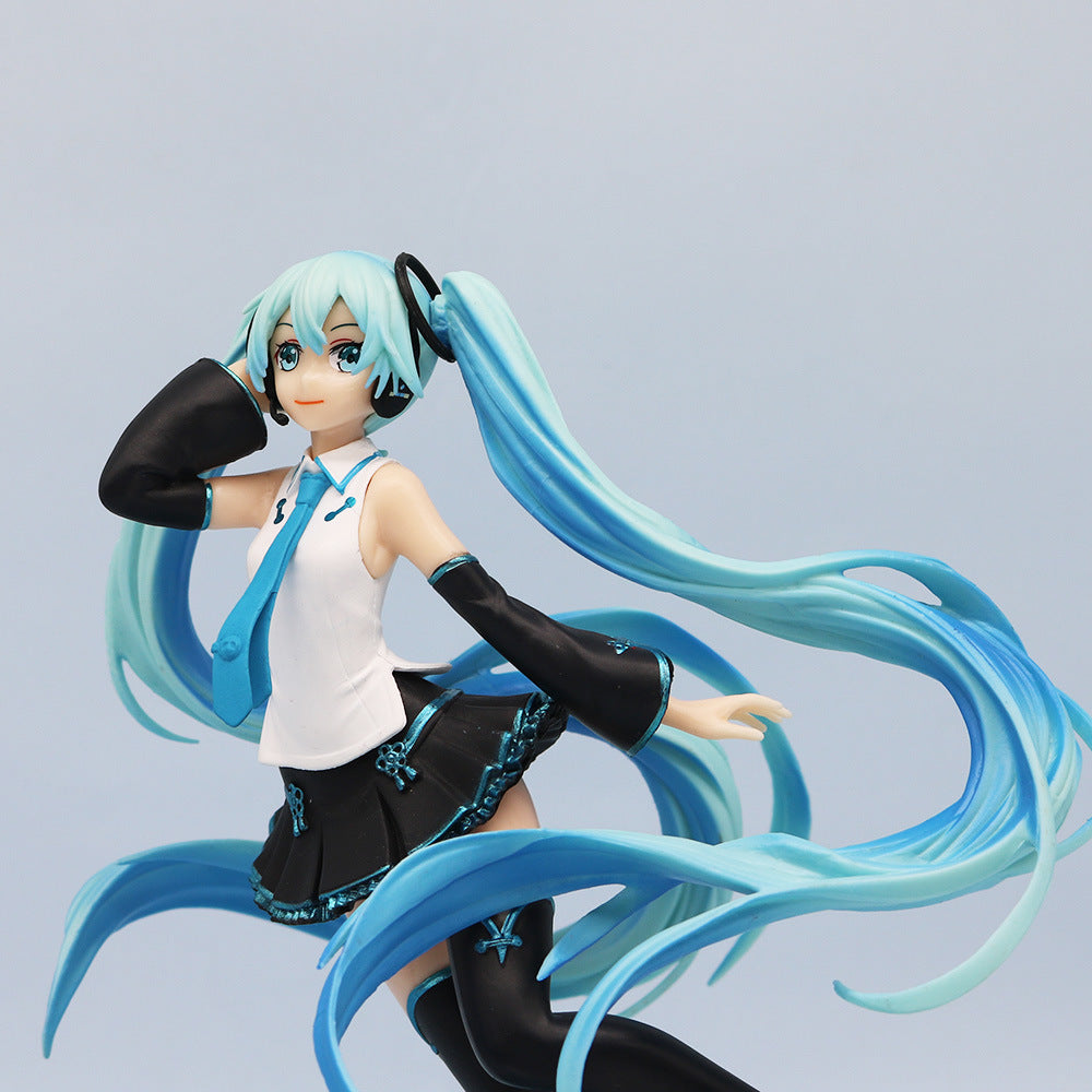 The Flying Hatsune Miku 20cm PVC Figure by Hatsune Miku captures her iconic style with turquoise pigtails, a teal and white top, black skirt, and tall boots. Her dynamic flying pose with one arm raised is perfect for Vocaloid fans seeking to showcase her expressive energy. Comes in a box.