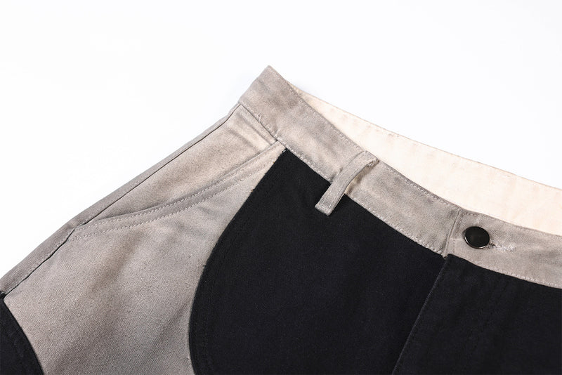 Wide-Leg-Patchworkhose – abstraktes Wellenmuster aus zweifarbigem, schwarz-grauem Washed-Denim