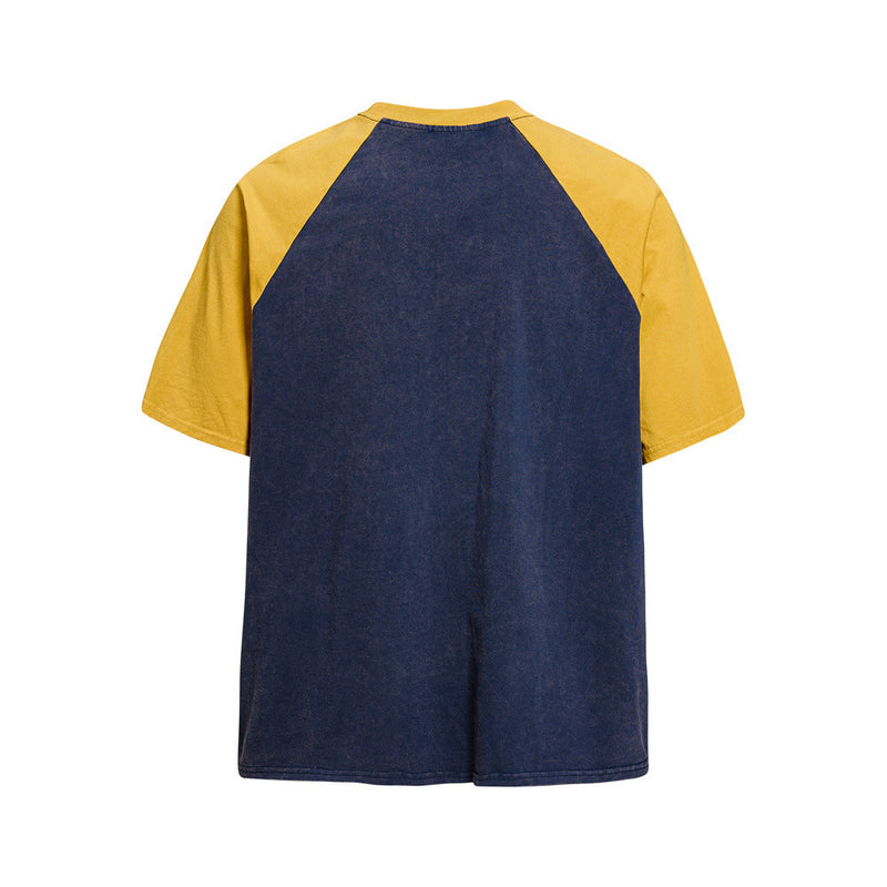 Vintage colorblock raglan T-shirt with navy body and mustard yellow sleeves, shown from the back on a white background