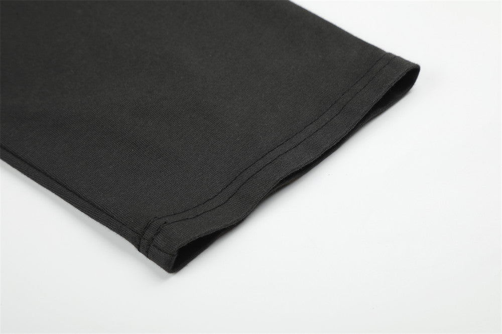 Close-up of black long sleeve sleeve cuff with clean hem stitching