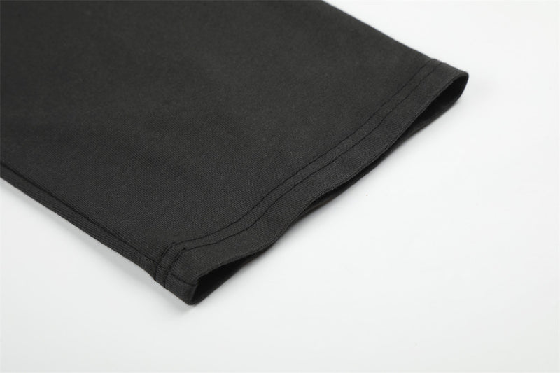 Close-up of black long sleeve sleeve cuff with clean hem stitching