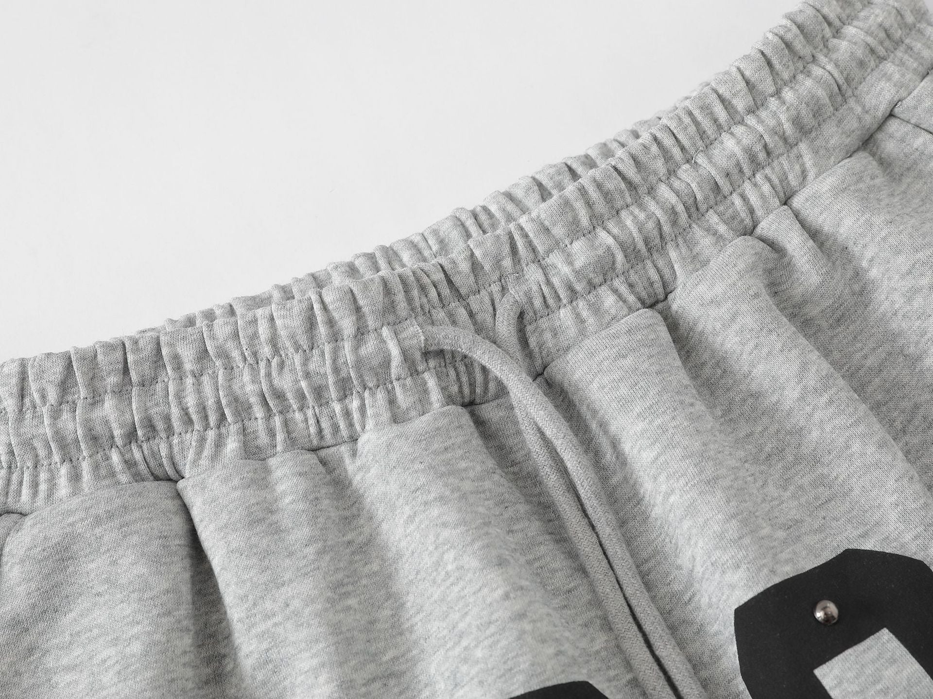 Pantalon de survêtement à jambes larges clouté d’étoiles 1996 avec détail à trois bandes