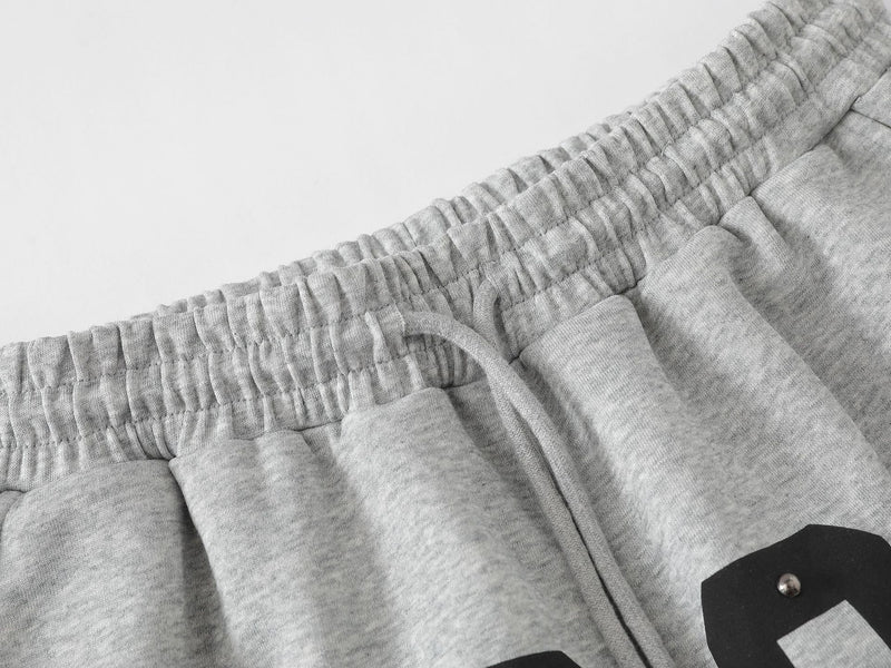 Pantalon de survêtement à jambes larges clouté d’étoiles 1996 avec détail à trois bandes