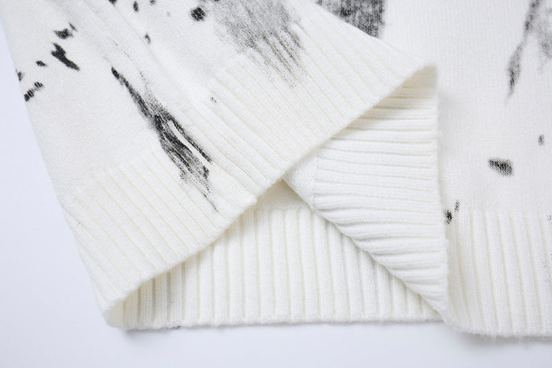 Pull en maille col rond éclaboussures d’encre – Motif peinture déstructuré