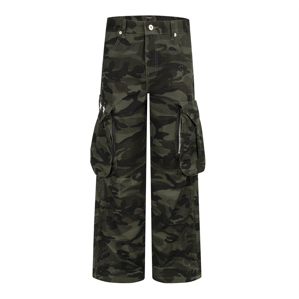 Baggy green camouflage wide-leg cargo pants with 3D zip pockets and paint-splatter detailing, front and back view