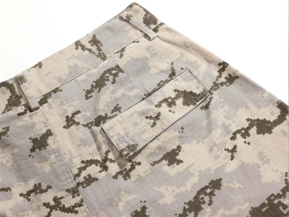 Close-up of rear cargo pocket flap on desert camo trousers
